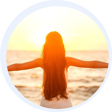 A woman feeling happy at beach