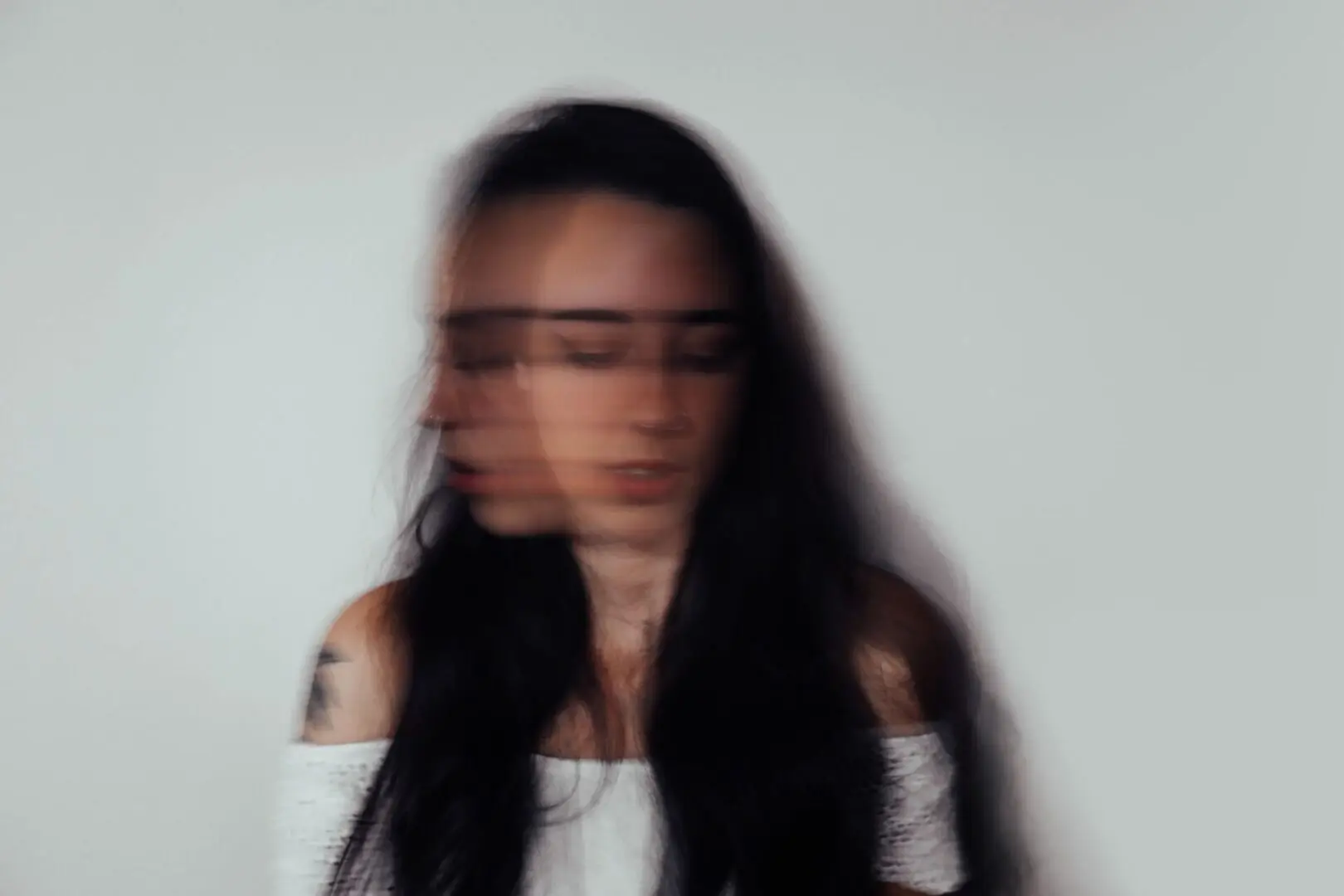 A young woman experiencing Bipolar disorder at home